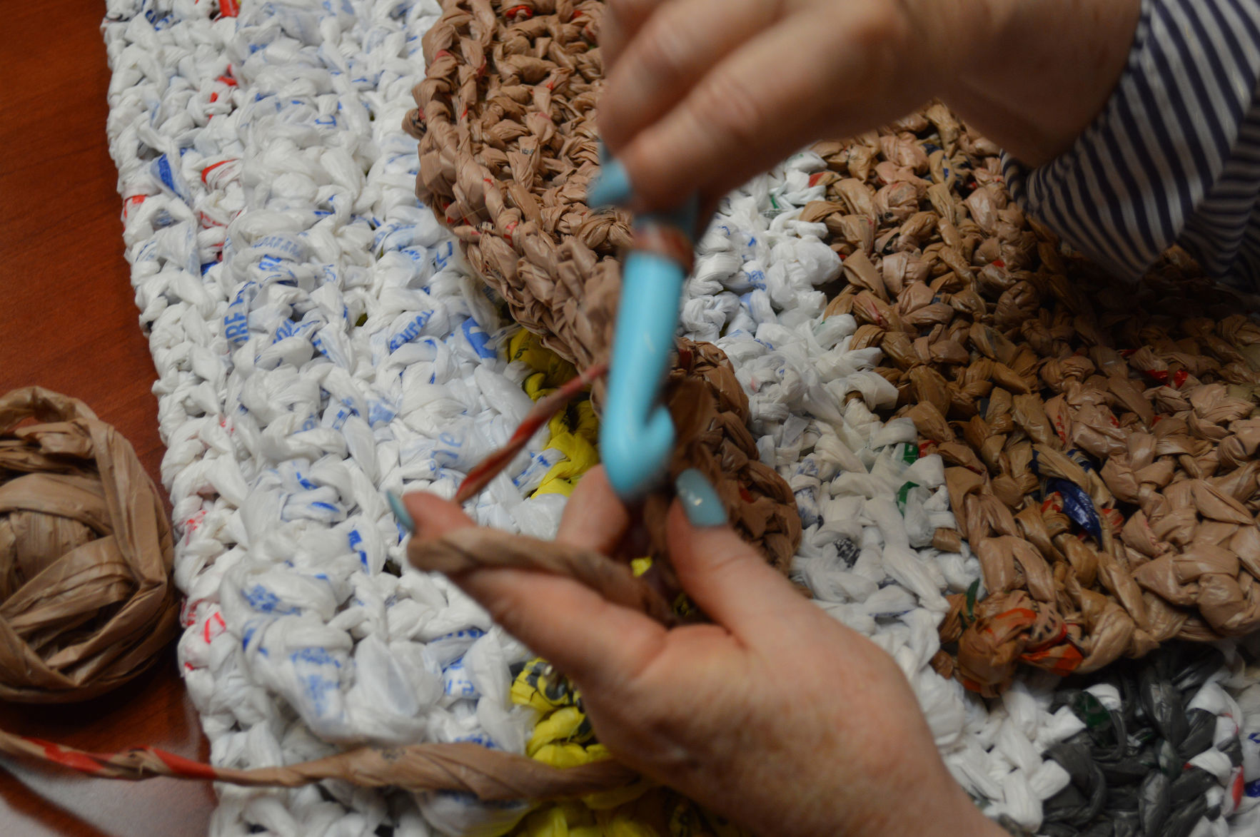 Homeless benefit from seniors' project to upcycle grocery bags
